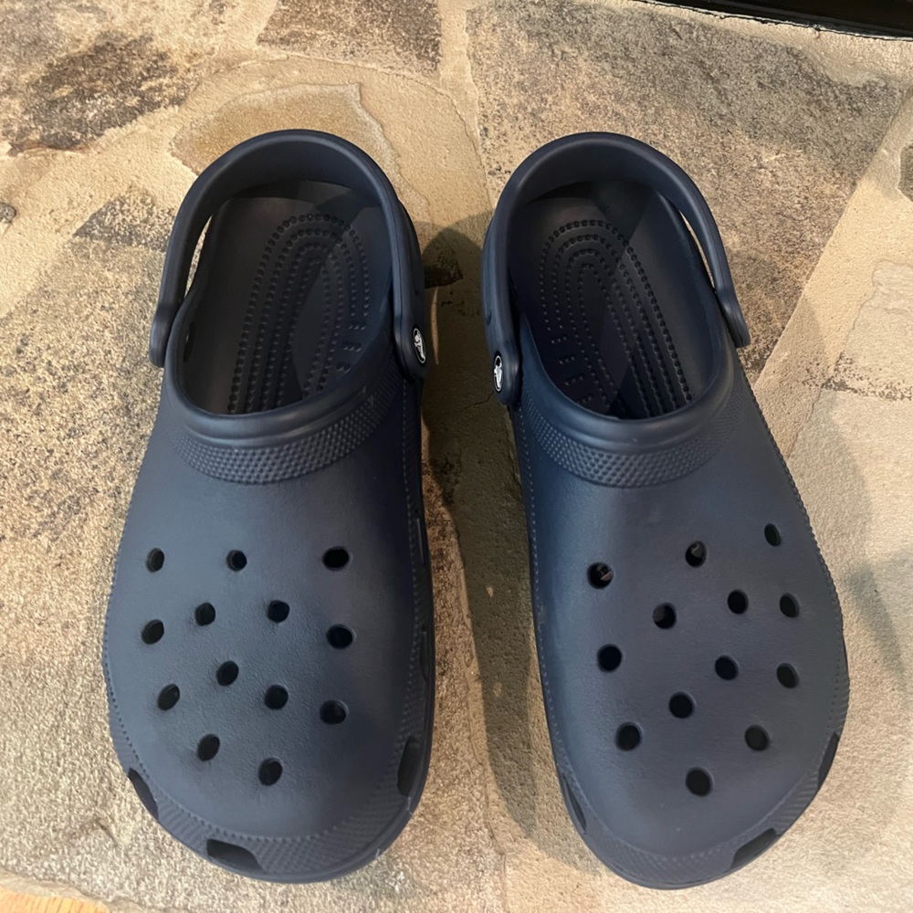 Lightly worn Crocs. Navy color, size 11 in Men’s